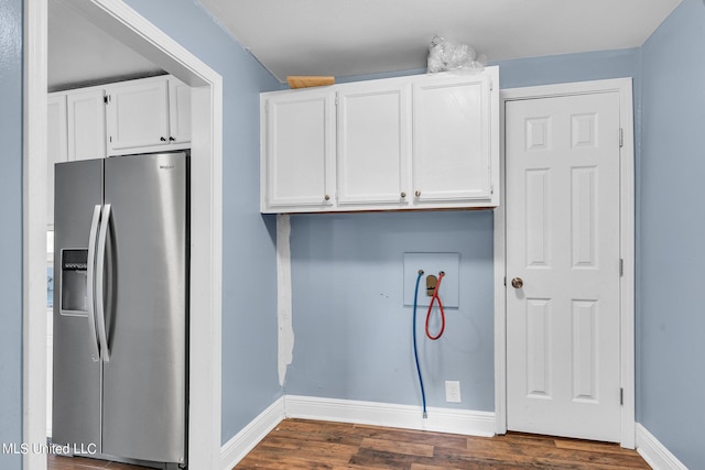 clothes washing area featuring hookup for a washing machine and dark hardwood / wood-style floors