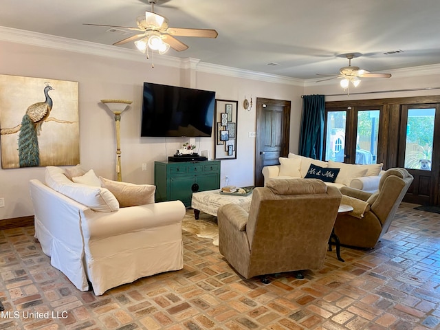 living room with crown molding and ceiling fan