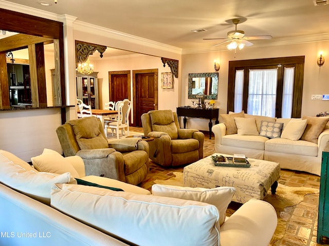 living room with crown molding and ceiling fan