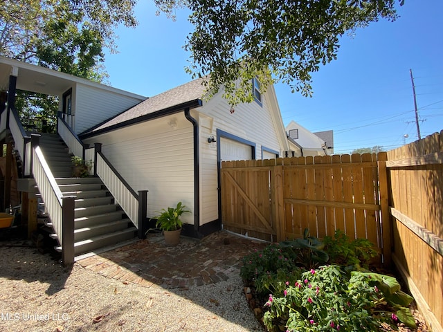 view of home's exterior with a garage