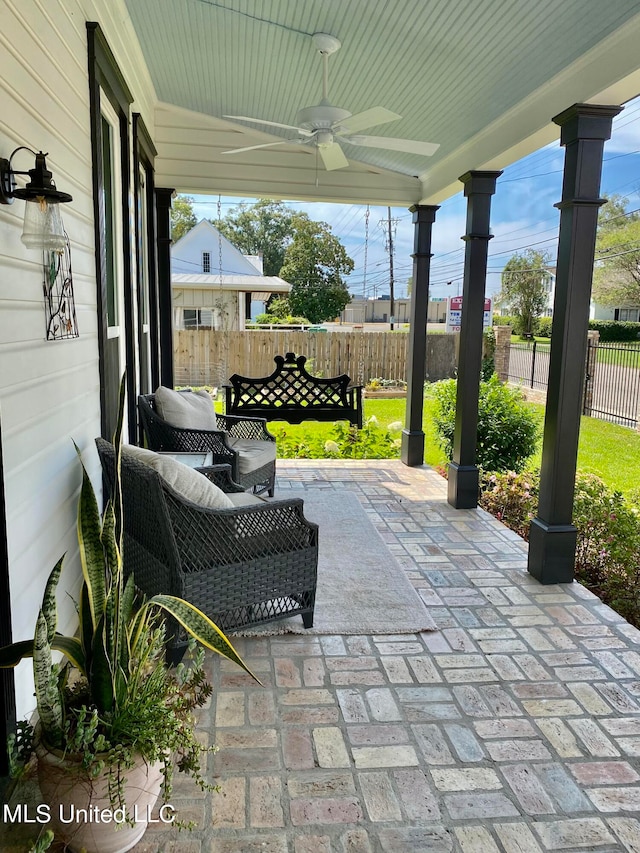 view of patio / terrace featuring ceiling fan