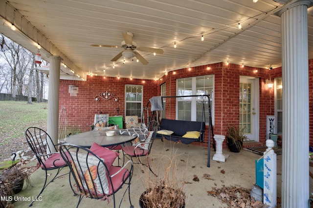 view of patio / terrace featuring outdoor dining area and a ceiling fan