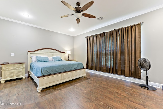 bedroom featuring ornamental molding, ceiling fan, and dark hardwood / wood-style flooring