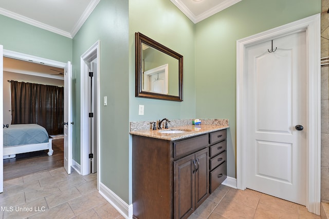 bathroom featuring vanity, ornamental molding, and hardwood / wood-style flooring