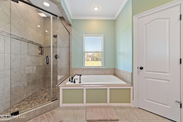 bathroom with tile patterned flooring, ornamental molding, and shower with separate bathtub