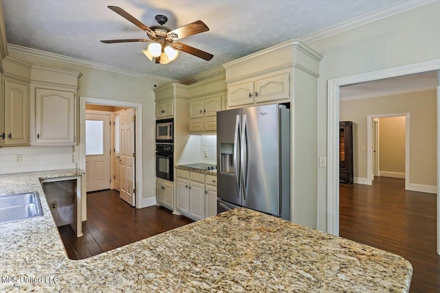 1507 W Flowers Rd, Terry, MS 39170 - kitchen with appliances with stainless steel finishes, dark wood finished floors, ceiling fan, crown molding, and light stone counters