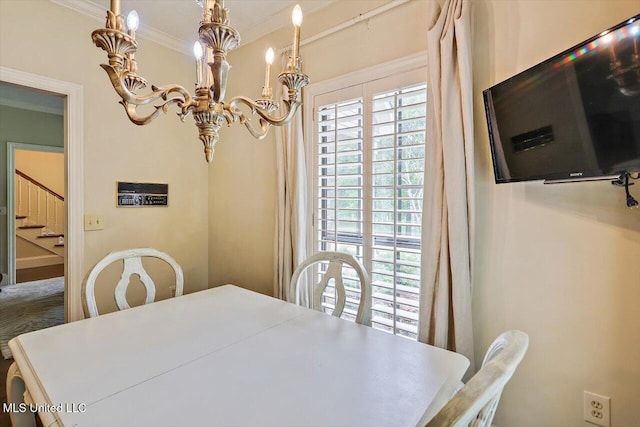 1507 W Flowers Rd, Terry, MS 39170 - dining area with ornamental molding, stairs, and a chandelier