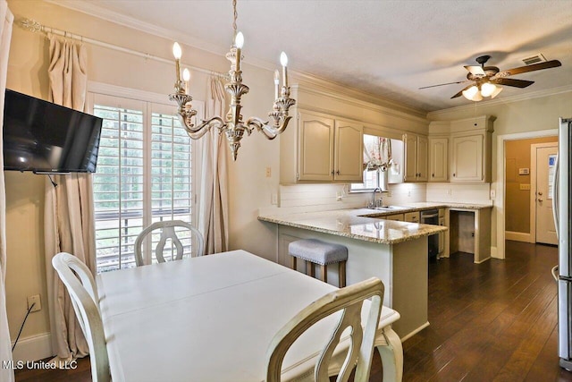 1507 W Flowers Rd, Terry, MS 39170 - kitchen with a sink, a peninsula, baseboards, crown molding, and ceiling fan