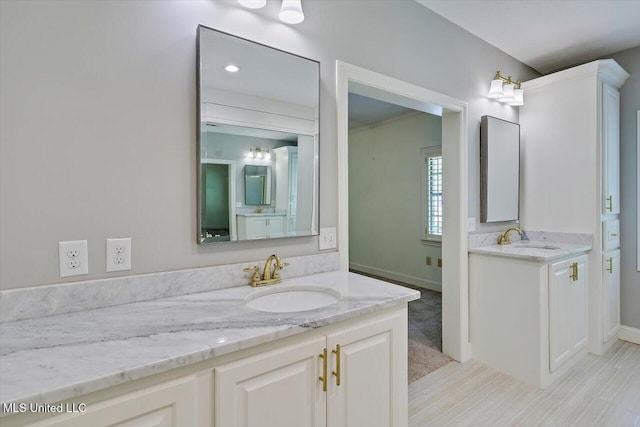 1507 W Flowers Rd, Terry, MS 39170 - full bath featuring two vanities and baseboards