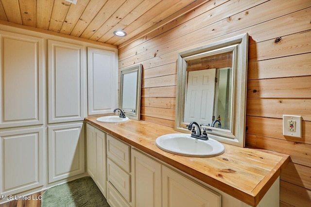 1507 W Flowers Rd, Terry, MS 39170 - full bathroom featuring wooden ceiling, double vanity, and wooden walls