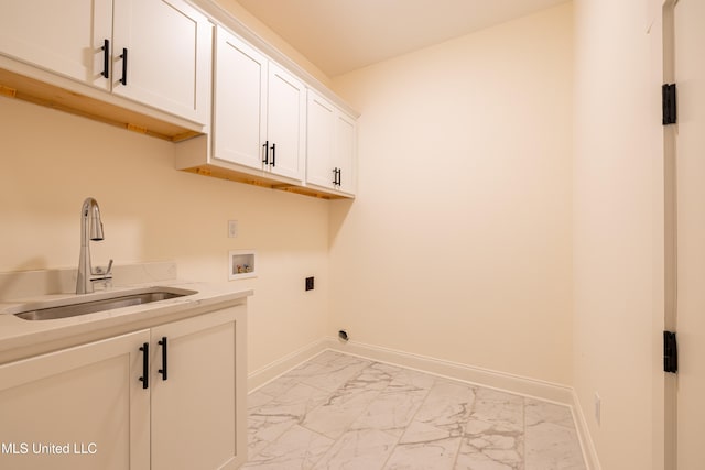 clothes washing area featuring washer hookup, electric dryer hookup, cabinets, and sink