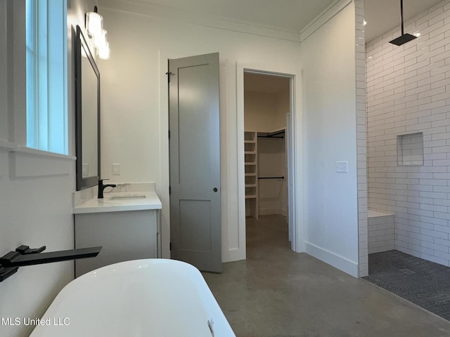 217 White Harbor Rd, Long Beach, MS 39560 - full bathroom with a freestanding tub, vanity, concrete flooring, and tiled shower