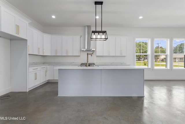 217 White Harbor Rd, Long Beach, MS 39560 - kitchen with crown molding, white cabinetry, wall chimney exhaust hood, and finished concrete floors