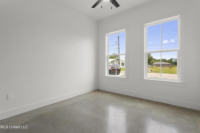 217 White Harbor Rd, Long Beach, MS 39560 - empty room featuring baseboards, ceiling fan, ornamental molding, and concrete flooring