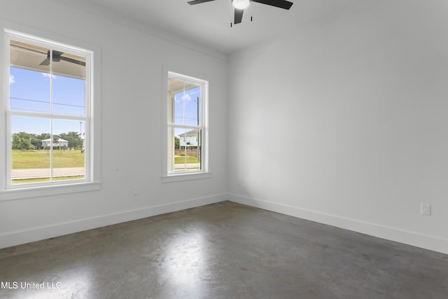 217 White Harbor Rd, Long Beach, MS 39560 - spare room with baseboards, a ceiling fan, and concrete flooring