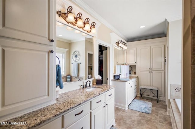 bathroom with ornamental molding, two vanities, recessed lighting, tile patterned floors, and a sink