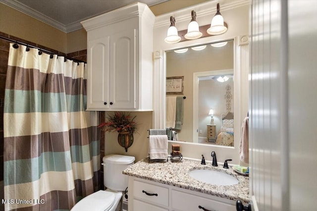 bathroom featuring vanity, crown molding, curtained shower, and toilet