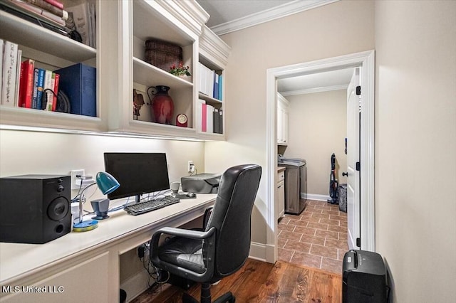 office featuring baseboards, wood finished floors, washer / dryer, and ornamental molding