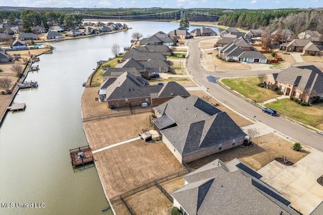 aerial view with a water view and a residential view