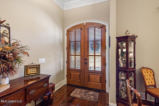 foyer with french doors, baseboards, dark wood-style flooring, and crown molding