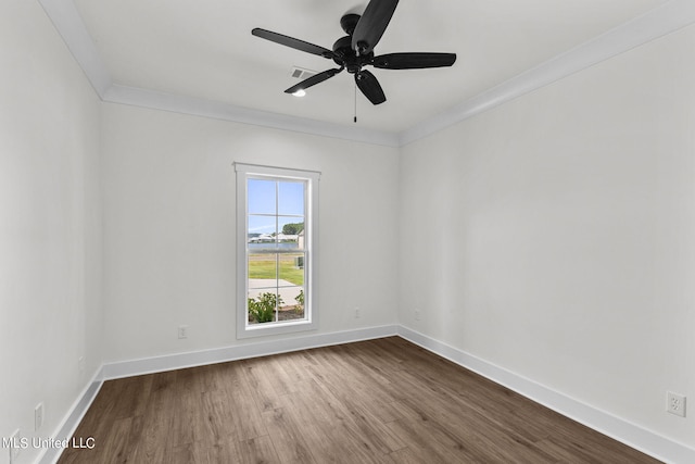 unfurnished room with ornamental molding, wood-type flooring, and ceiling fan