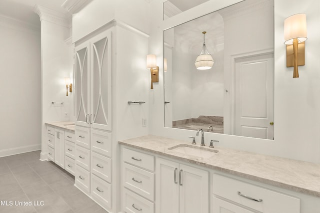 bathroom with vanity and ornamental molding