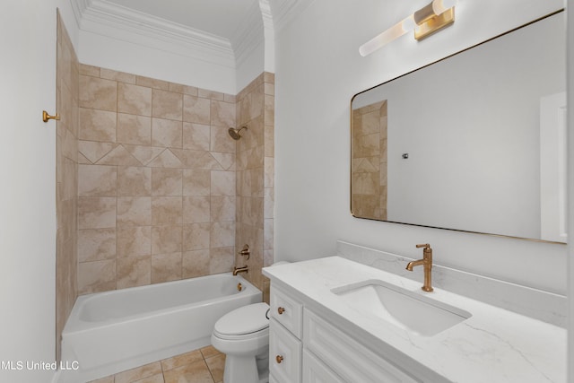 full bathroom featuring tiled shower / bath, toilet, ornamental molding, vanity, and tile patterned floors