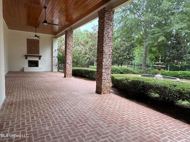 view of patio / terrace featuring ceiling fan