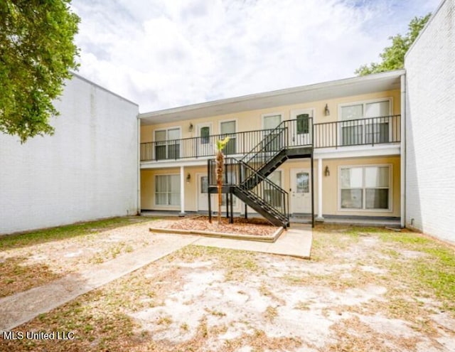 3230 Cumberland Rd Unit 78, Ocean Springs, MS 39564 - view of building exterior featuring stairway
