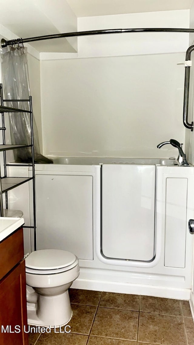 3230 Cumberland Rd Unit 78, Ocean Springs, MS 39564 - full bath featuring vanity, tile patterned flooring, and a shower with curtain