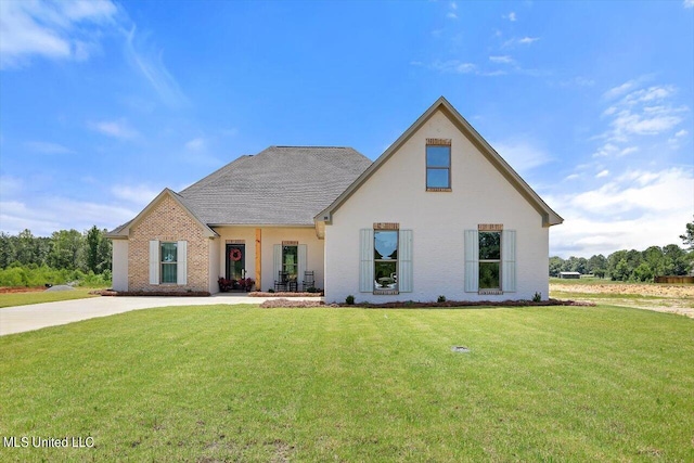 view of front of home with a front yard