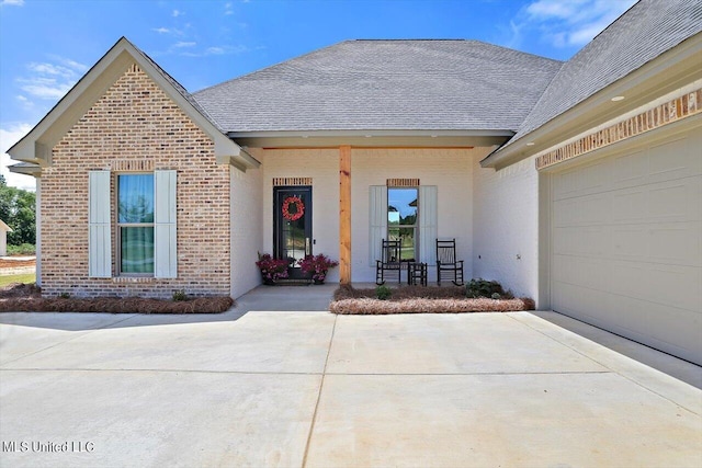 property entrance with a garage