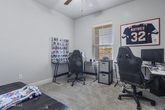 home office with carpet, baseboards, and ceiling fan