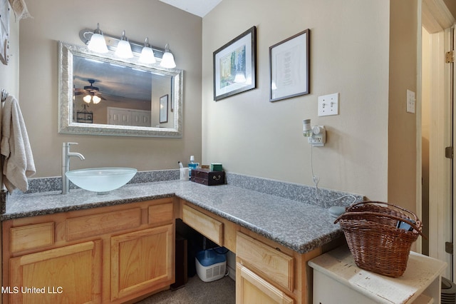 bathroom featuring vanity and ceiling fan