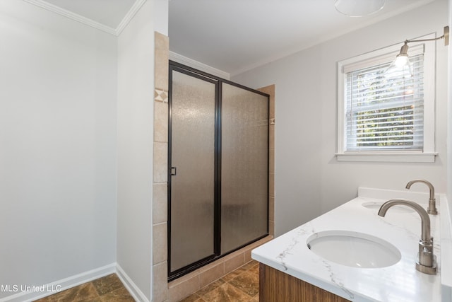 bathroom featuring vanity, an enclosed shower, and ornamental molding