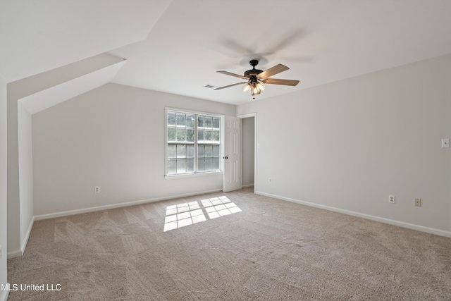 bonus room with light carpet, ceiling fan, and vaulted ceiling