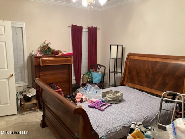 bedroom with ornamental molding