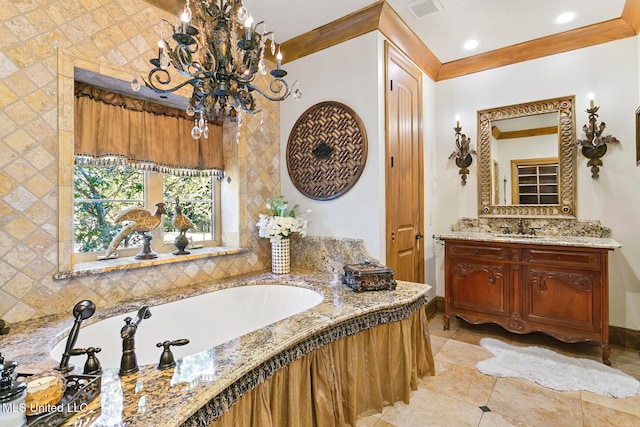 bathroom with a bathing tub, vanity, crown molding, and tile patterned floors