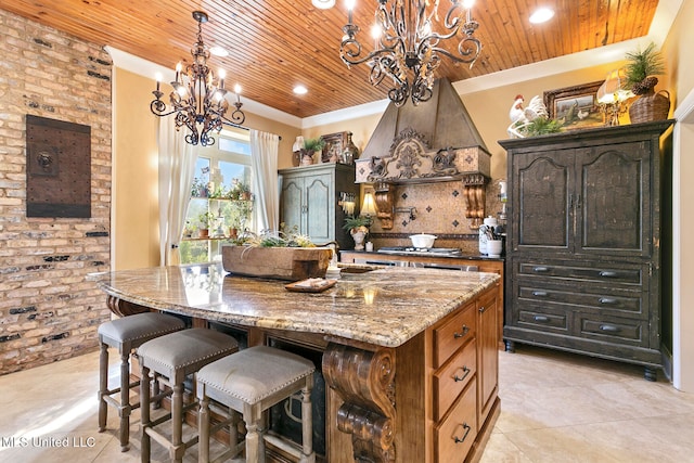 kitchen with an inviting chandelier, dark stone countertops, an island with sink, custom range hood, and wood ceiling