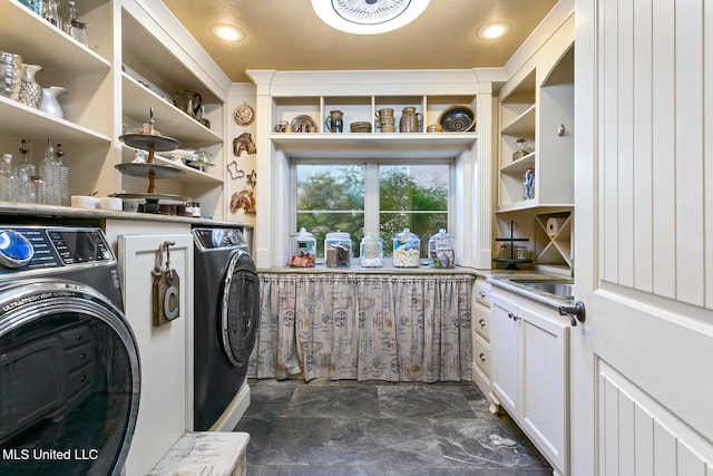 laundry room with independent washer and dryer