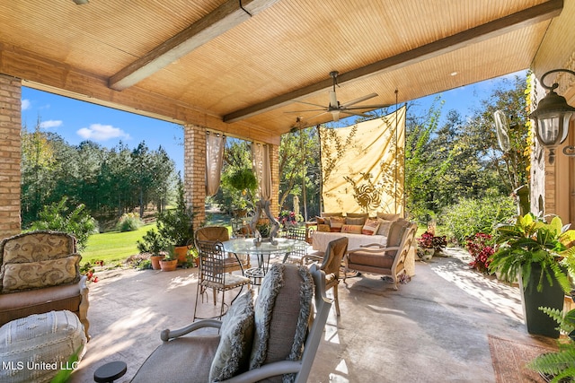 view of patio with ceiling fan