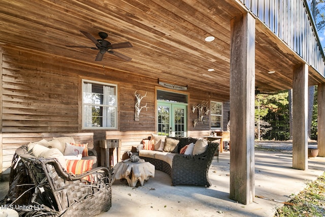 view of patio / terrace featuring ceiling fan and an outdoor living space