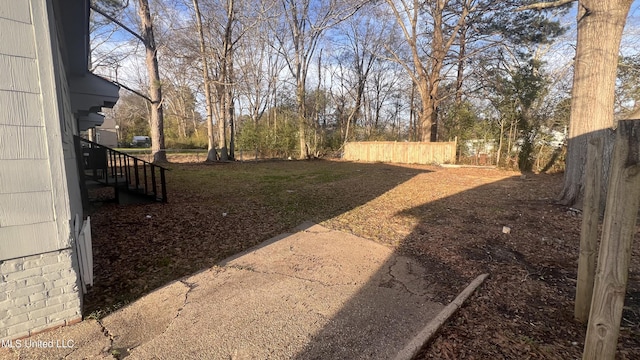 view of yard with fence