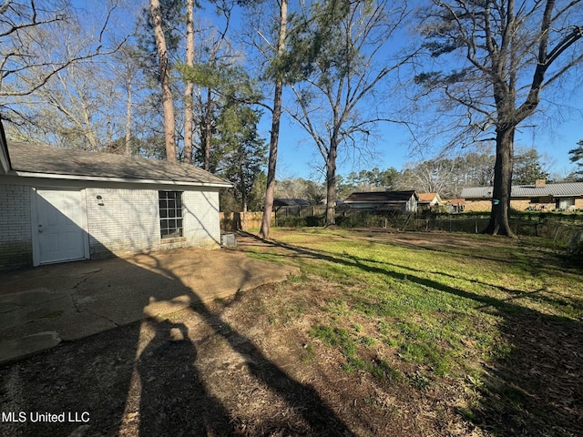 view of yard with fence