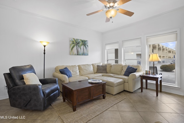 living room with crown molding, ceiling fan, and light tile patterned floors