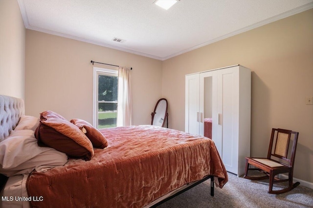 carpeted bedroom featuring visible vents, a textured ceiling, baseboards, and ornamental molding