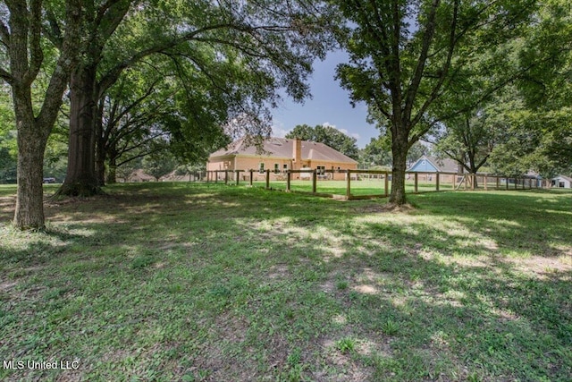 view of yard with fence