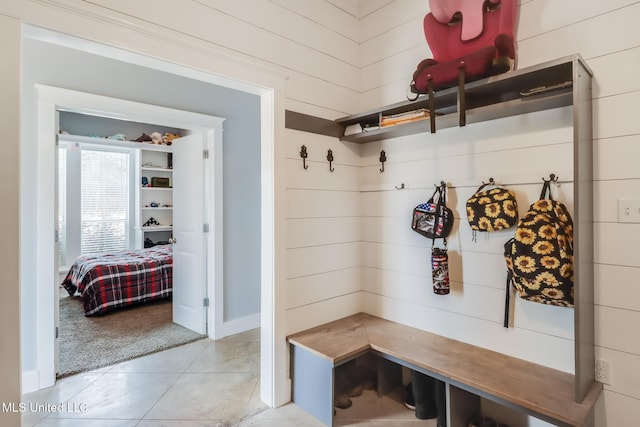 mudroom with light tile patterned floors