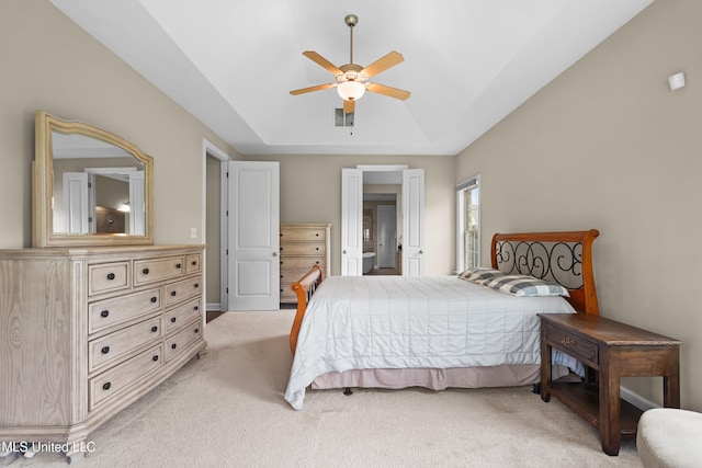 5110 Kensington Creek Dr, Southaven, MS 38672 - bedroom featuring light colored carpet, a raised ceiling, and a ceiling fan
