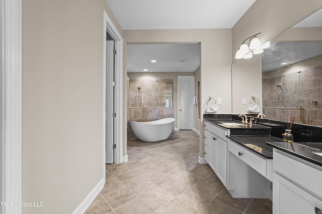 5110 Kensington Creek Dr, Southaven, MS 38672 - full bathroom featuring vanity, a tile shower, a freestanding tub, recessed lighting, and tile patterned floors